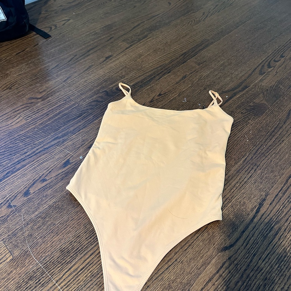 Babaton One Piece Bodysuit in light orange